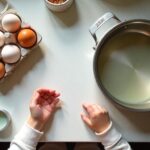 Person deciding between boiling or frying Eggs for breakfast at home